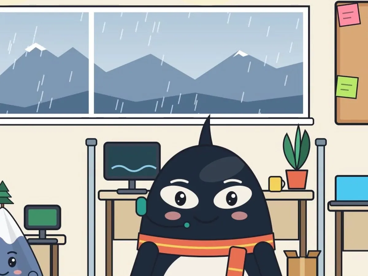 Marlo at his desk, with a rainy window and grey-blue mountains behind him.